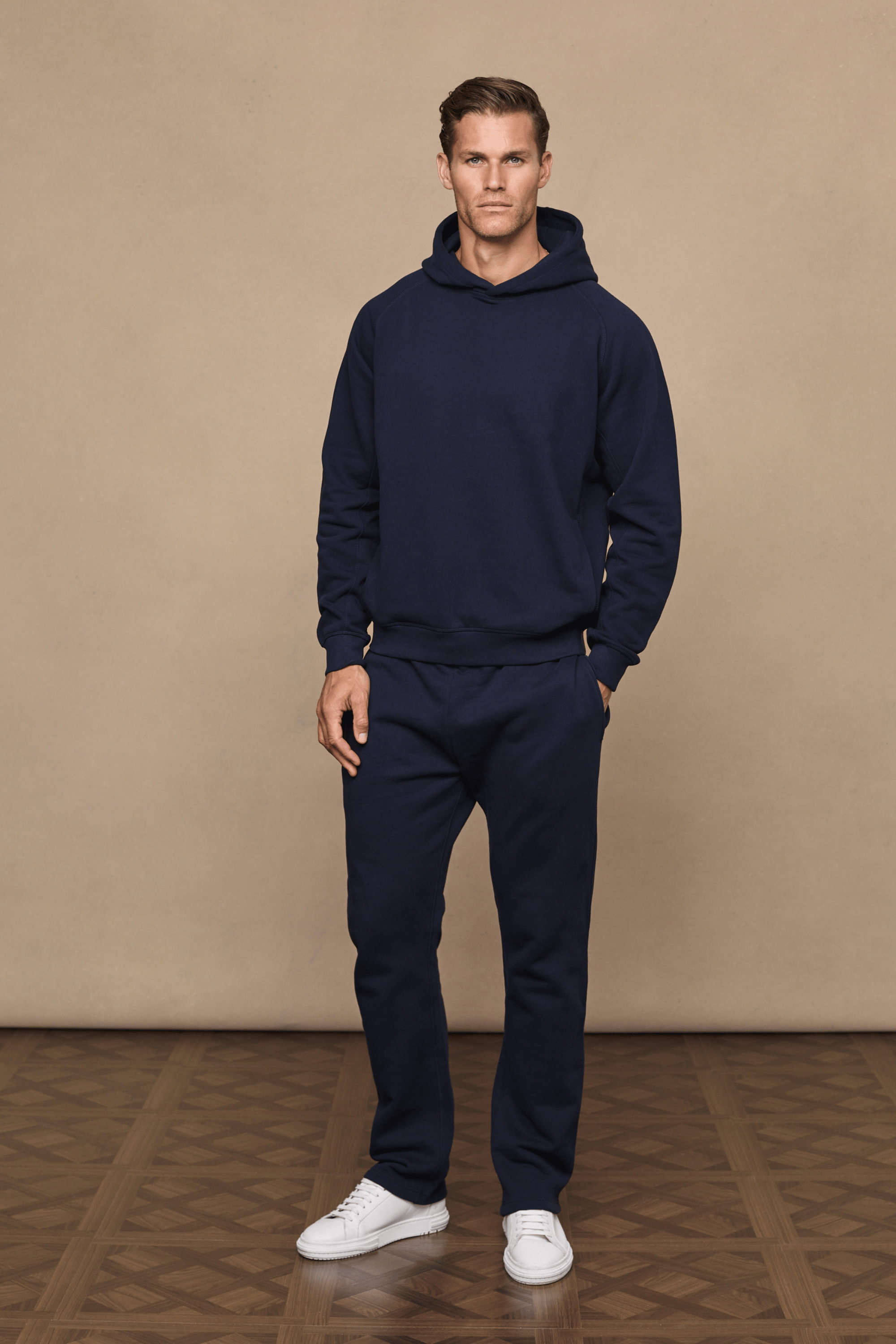 Men’s heavyweight cotton blend hoodie in navy with raglan sleeves by Raith