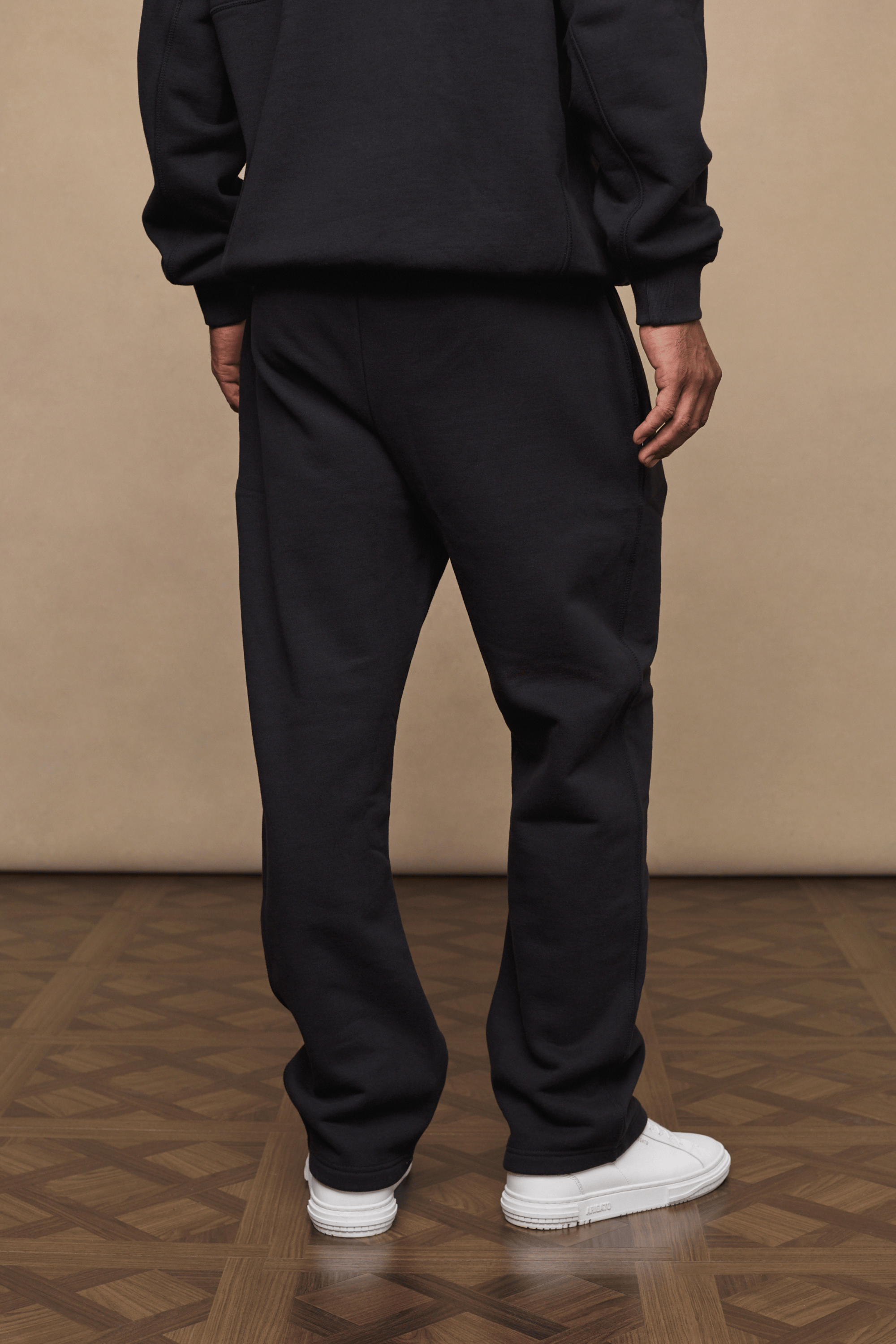 Men’s heavyweight cotton blend joggers in black with straight leg fit by Raith