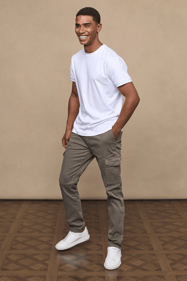 Men’s cotton stretch cargo trousers in dark olive with straight leg fit and utility pockets by Raith